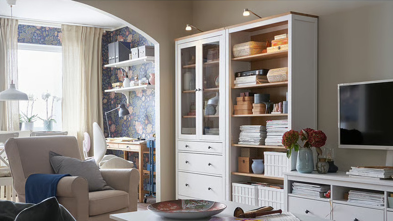 IKEA HEMNES Bookshelf alongside HEMNES glass cabinet in a living room