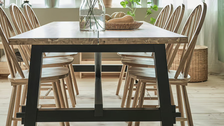 SKOGSTA table with chair with decorations on the tabletop