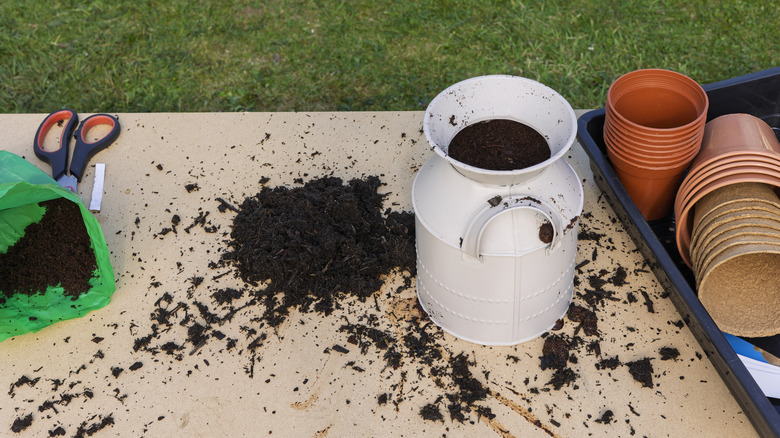 potting bench with spilled soil
