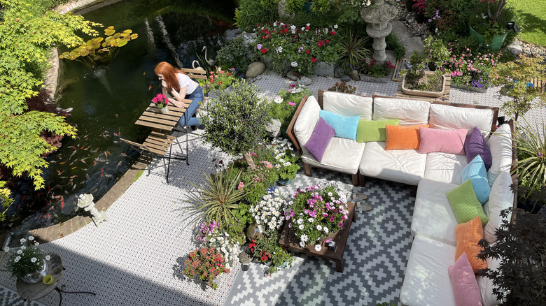 patio setup with rug in garden