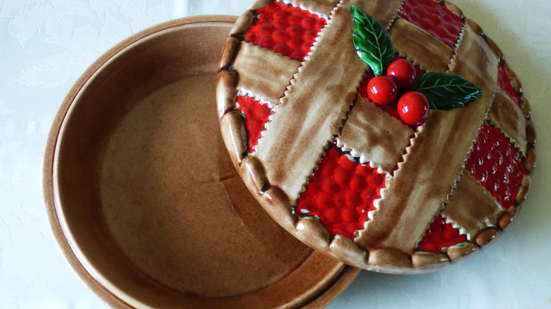 vintage ceramic pie dish with lid on counter.