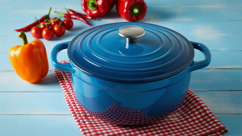 A blue enamelled Dutch oven