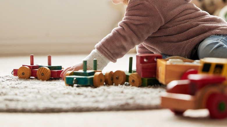 Child playing with toys