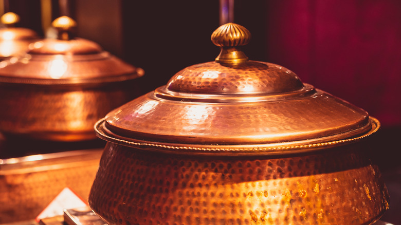 Copper dishes on a table