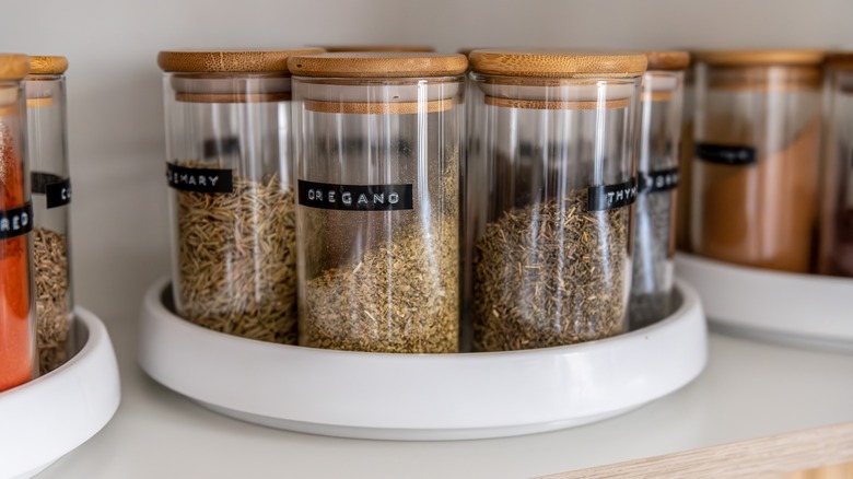 Organized spices in a kitchen cabinet