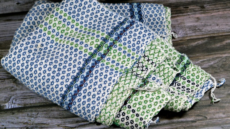 Old and frayed patterned dishcloth