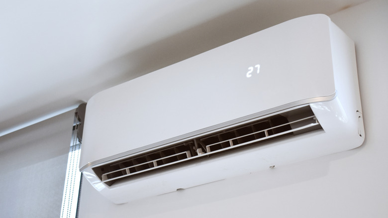 White wall-mounted AC unit