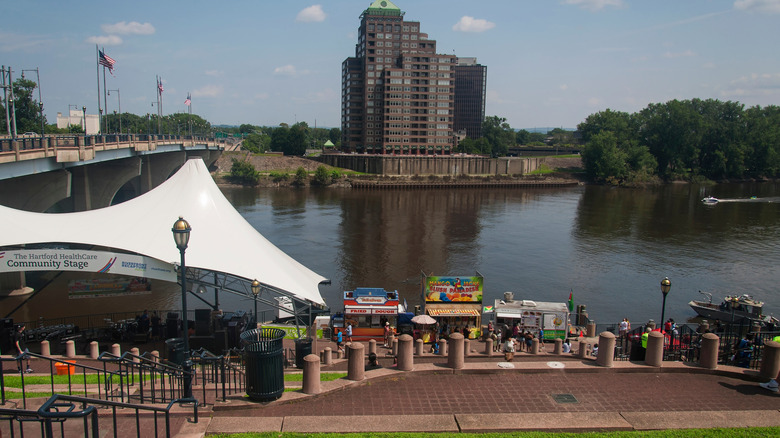 Hartford, Connecticut river boardwalk with music stage and food vendors