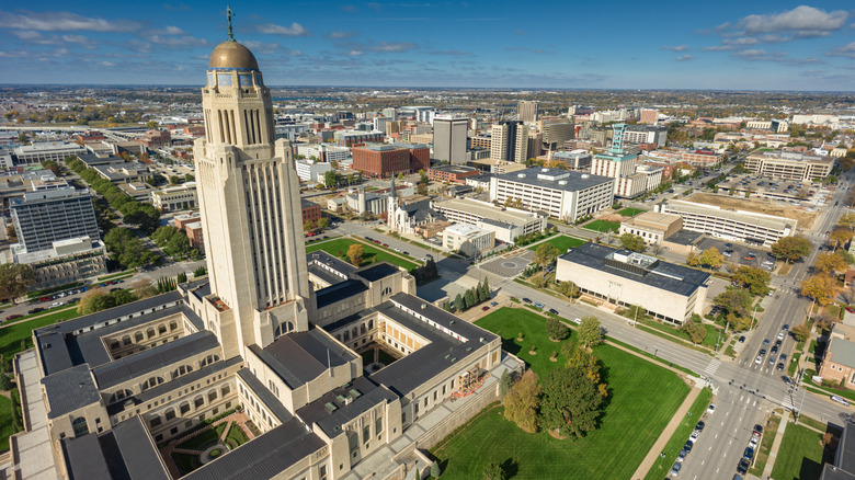 Aerial view of the Nebraska State Capitol building and surrounding city