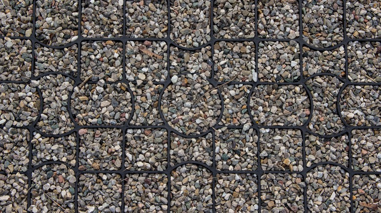 Ground stabilization grids filled with gravel.