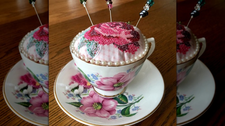 pink floral teacup pin cushion