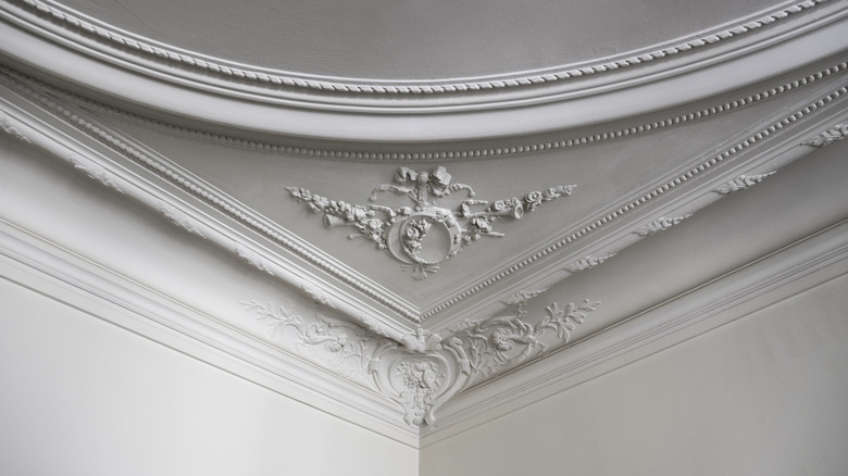 Crown molding covering a ceiling