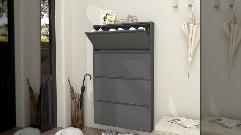 Slim shoe-storage unit hanging on an entryway wall