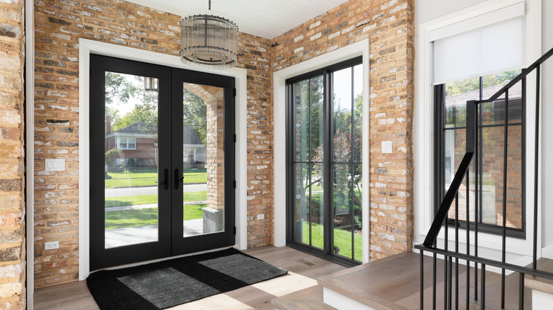 Open entryway with brick walls and stairs
