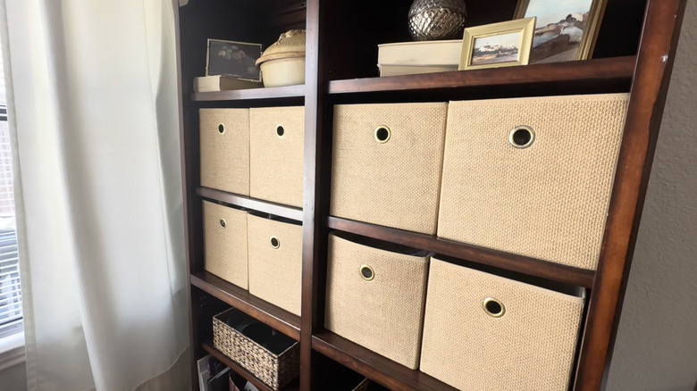 bookshelf with bin drawers