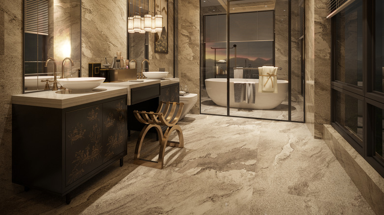 tan marble flooring in bathroom