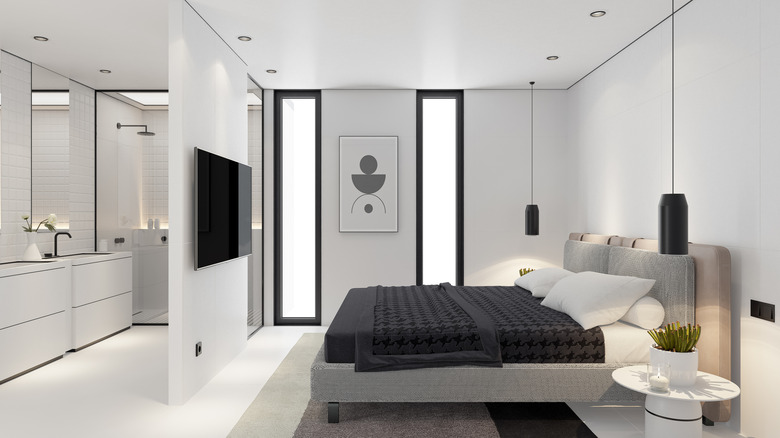 Modern bedroom with a doorless bathroom