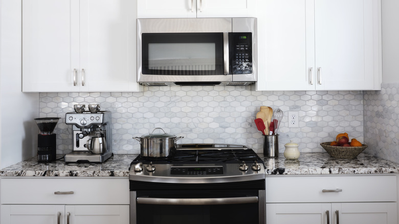 Kitchen microwave above a stove