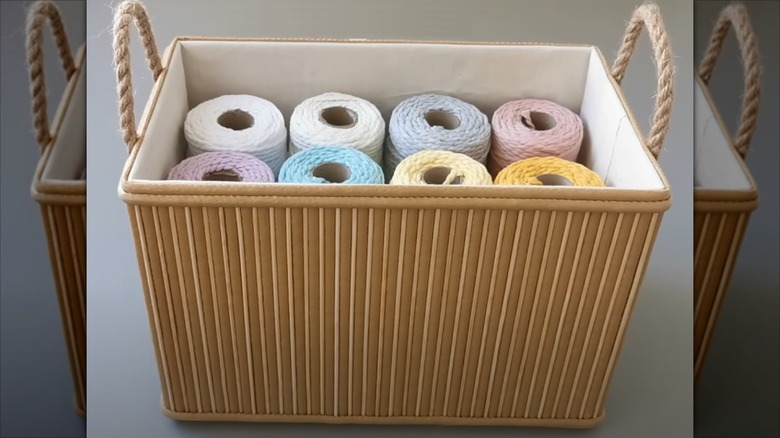 Craft storage box made from a box and a bathroom mat