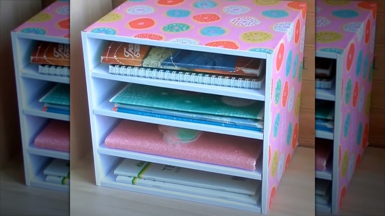 Bookshelf or magazine rack made from cardboard