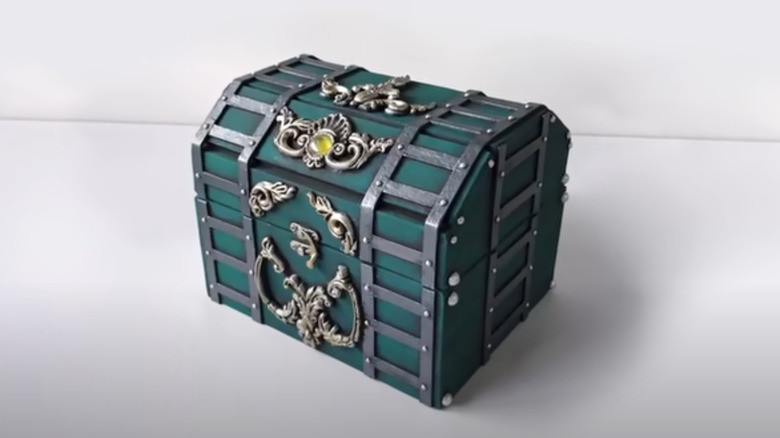 A vintage treasure chest with fine detailing made from cardboard