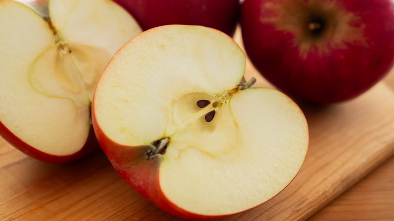 closeup of cut apples with seeds