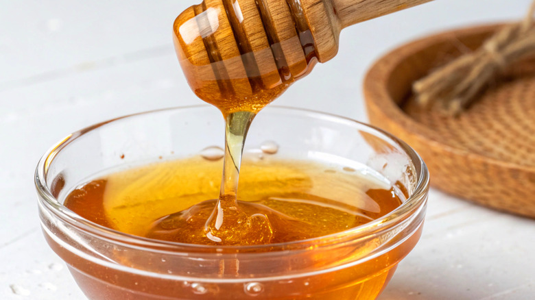 closeup on honey in small dish