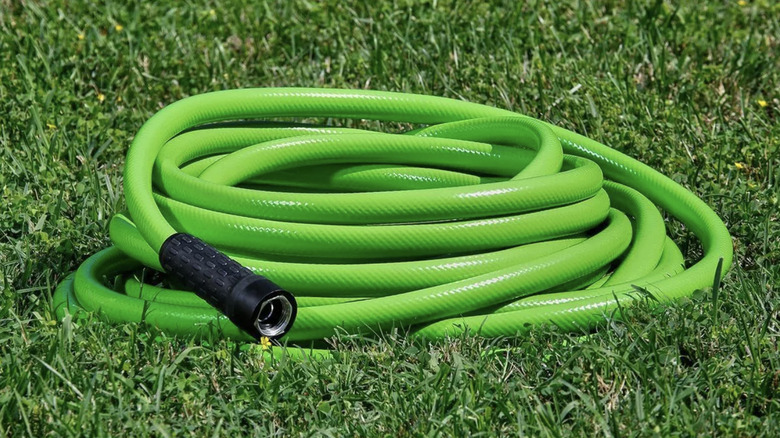 Niagara's green 50-foot hose sitting on grass