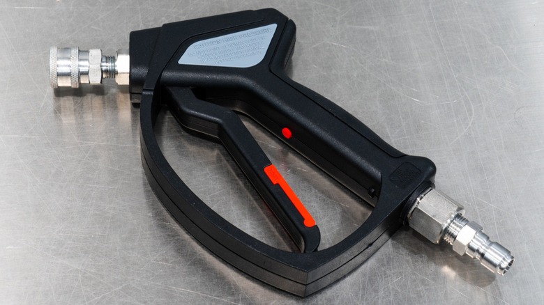 Pressure washer stubby spray gun on a white background