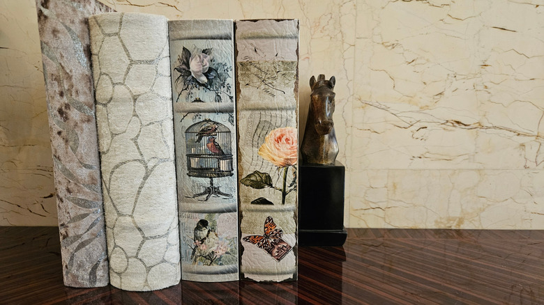 equestrian bookend with group of books on table
