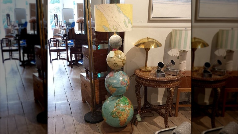 A four-globe floor lamp with a lamp shade
