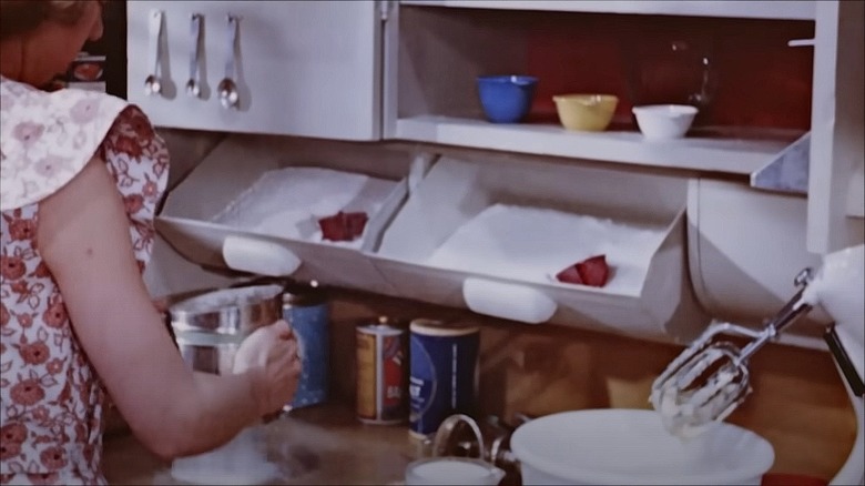 Closeup of bins built in under cabinets