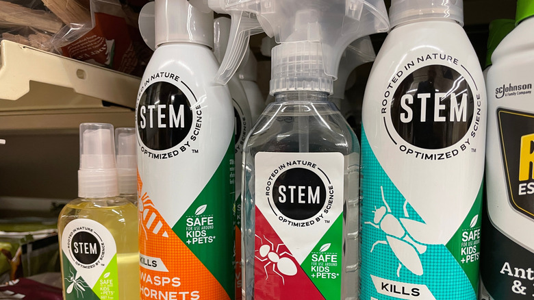 Several Stem pest control sprays on a store shelf