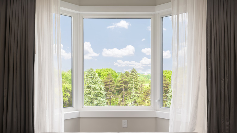 bay window with drapes