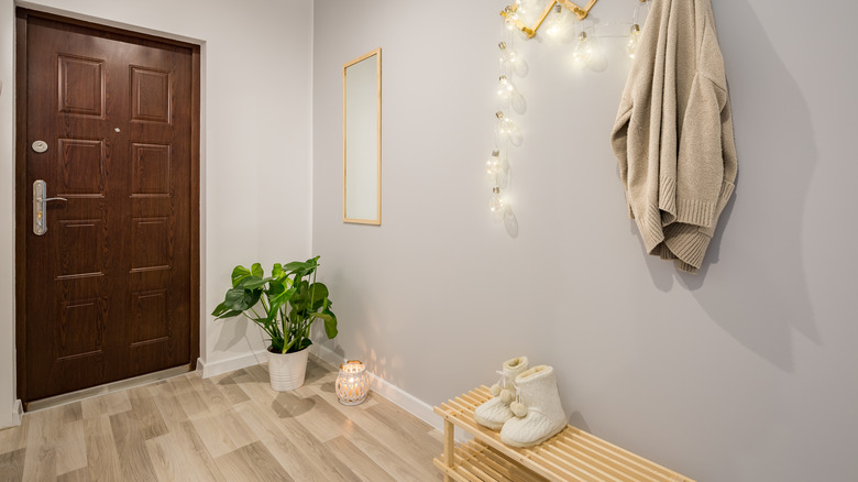 mudroom with bench and plant