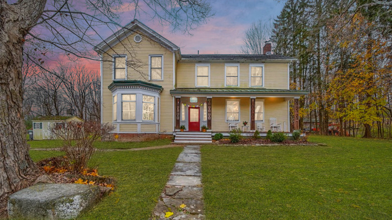 Yellow colonial home exterior