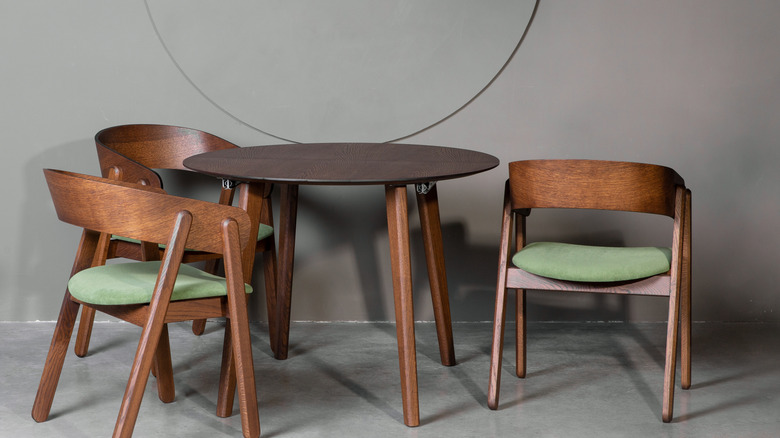 Modern kitchen interior with contemporary kitchen furniture and light wood cabinets.