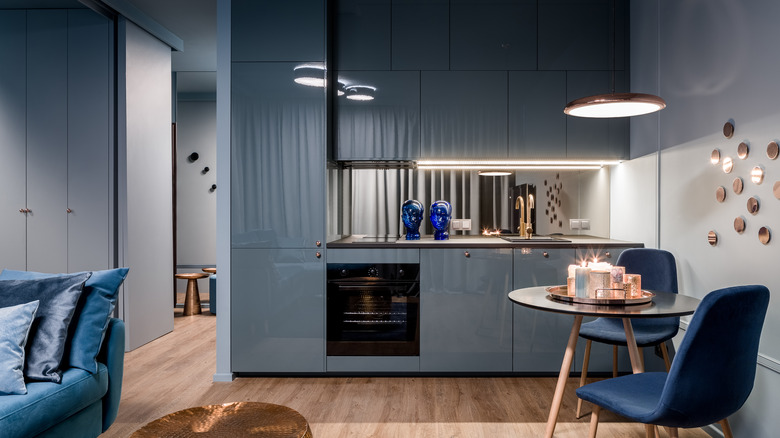 blue cabinets and kitchen furniture