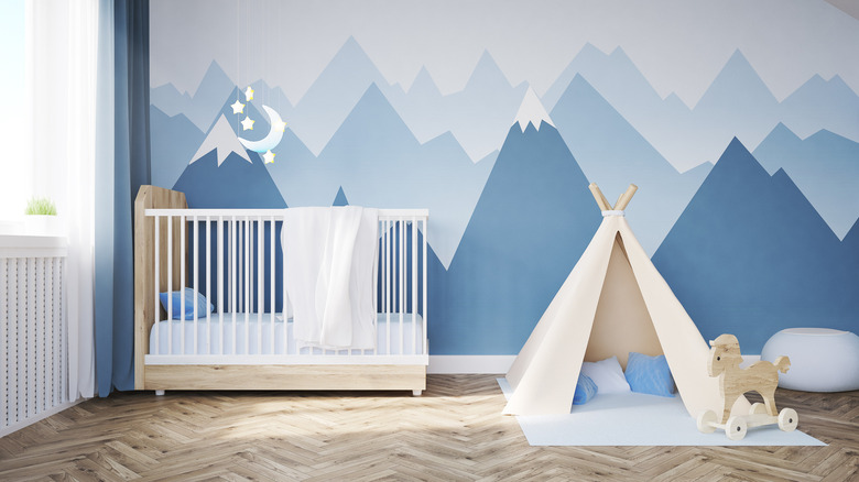 Nursery with a mural