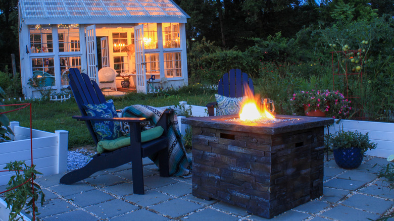 concrete tile patio with cozy fire