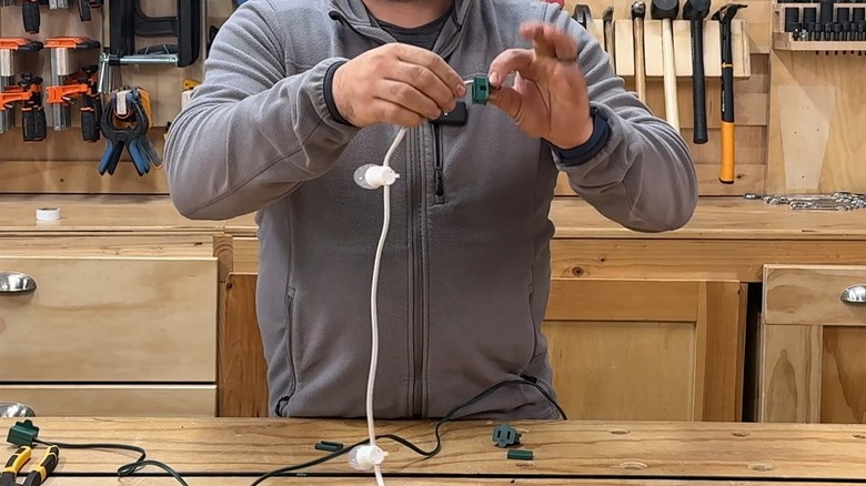Feeding a cut white wire through a green Gilbert plug