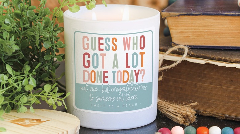 White candle with a funny message on top