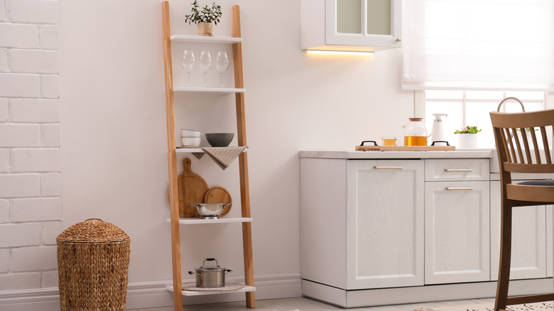 stylish kitchen with wooden ladder