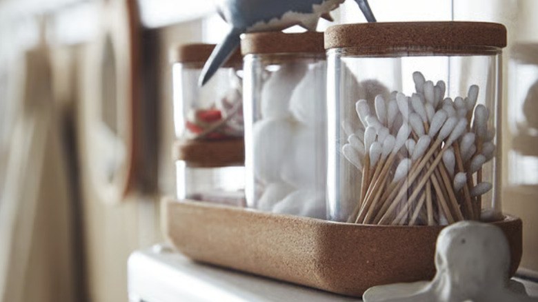 IKEA SAXBORGA jar with lid and tray set with bathroom products