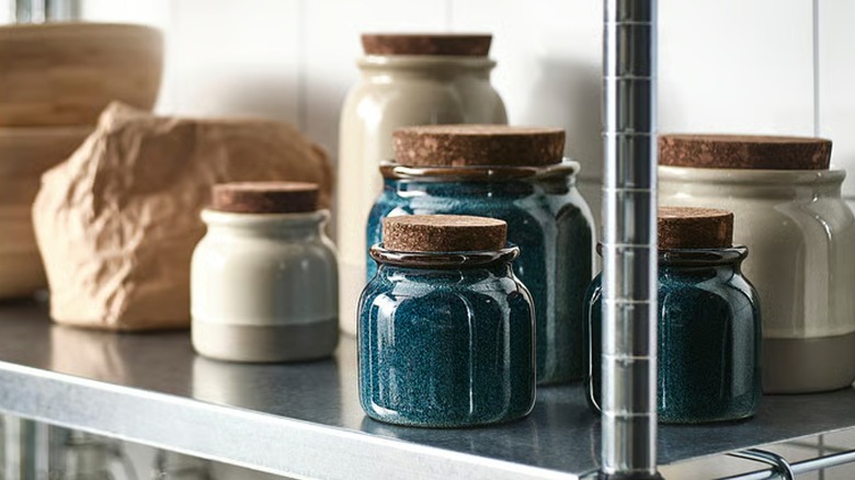 BRUGDHAJ blue glazed stoneware jar with lid in pantry shelf