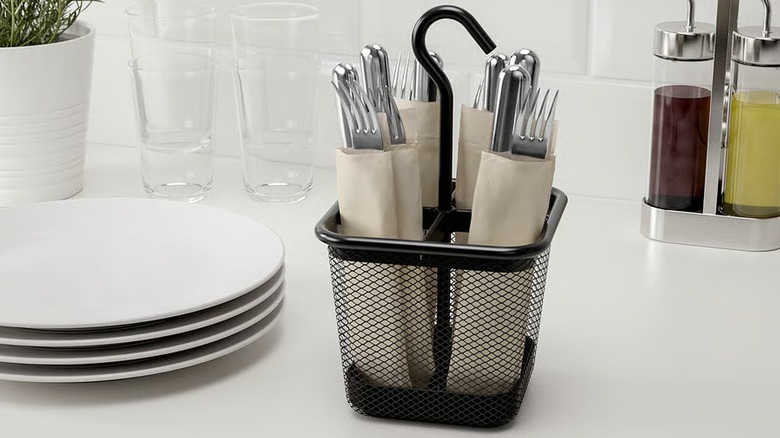 UPPDATERA black steel flatware caddy holding forks and knives