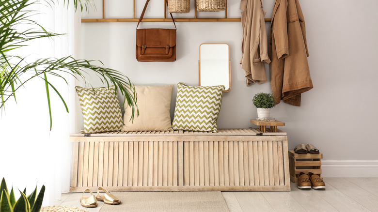 wooden storage bench in entryway