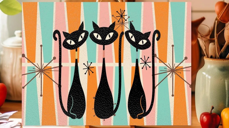 Atomic cat motif on a cutting board.