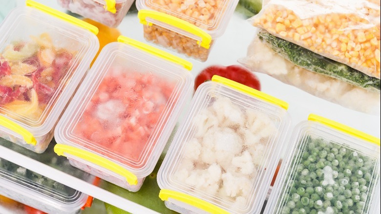 Containers of food in freezer
