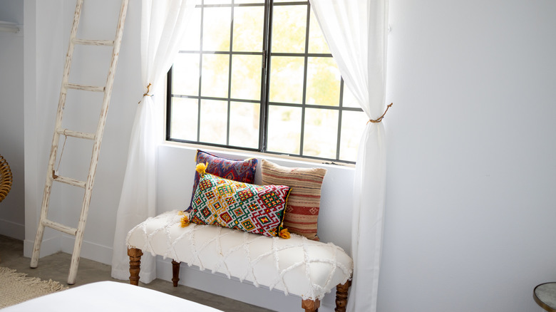 Southwestern pillows window bench